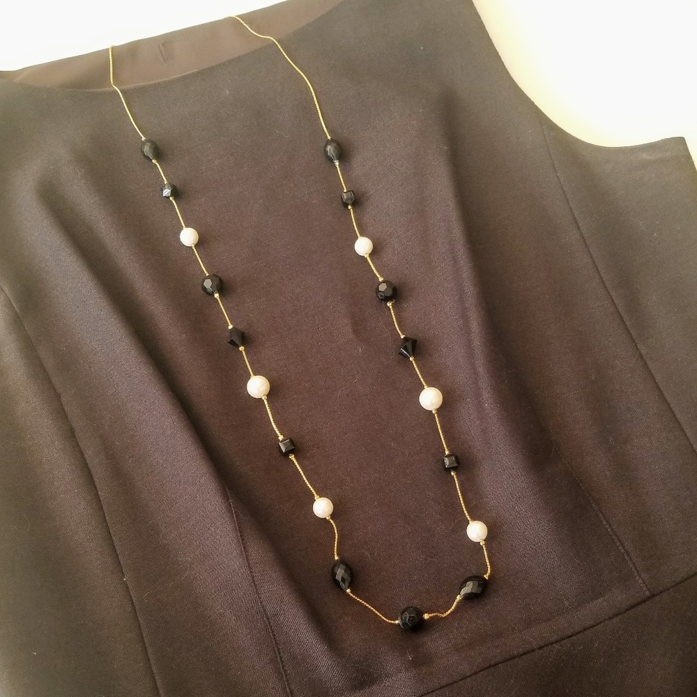 Gold Necklace with White and Black Beads